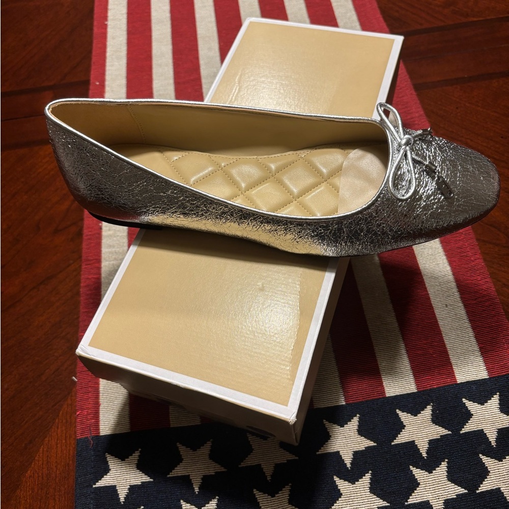 Michael Kors Shimmering Silver Loafers